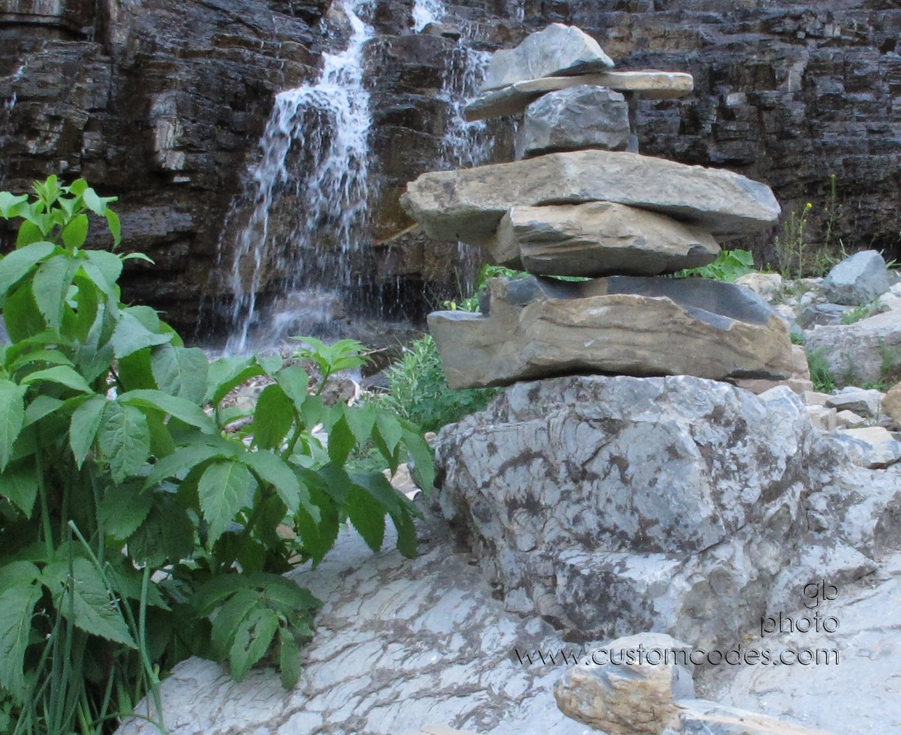 Glacier_StoneTowerWithWaterfall